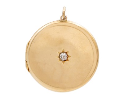 Lot 106 - A 14k gold locket pendant set with a diamond.