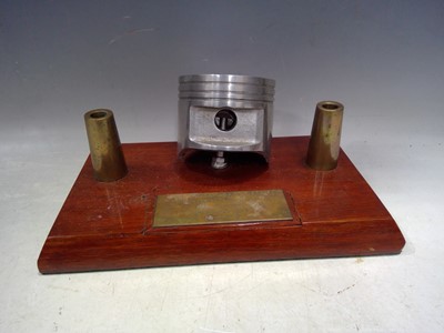 Lot 240 - A Piston Desk Tidy. The piece is 24cm wide and...