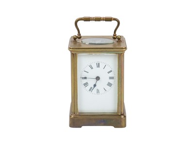 Lot 899 - A French brass cased carriage timepiece.