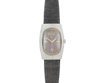 Lot 1014 - BULOVA - An Accutron sterling silver and 14k gold bezel quartz lady's dress wristwatch.