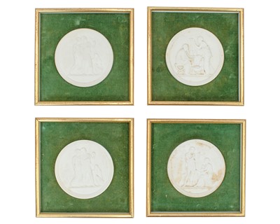 Lot 269 - A set of four circular bisque porcelain plaques.