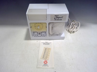 Lot 87 - A 1980s Swan Compact Teasmade. The Teasmade...