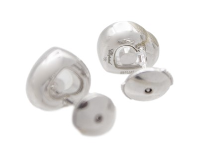 Lot 22 - CHOPARD - A pair of Happy Diamonds 18k white gold earrings.