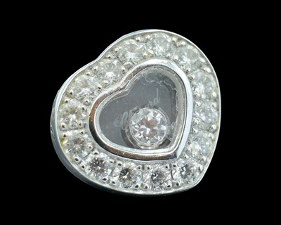 Lot 22 - CHOPARD - A pair of Happy Diamonds 18k white gold earrings.