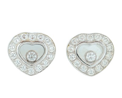 Lot 119 - CHOPARD - A pair of Happy Diamonds 18k white gold earrings.