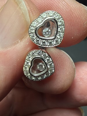 Lot 22 - CHOPARD - A pair of Happy Diamonds 18k white gold earrings.