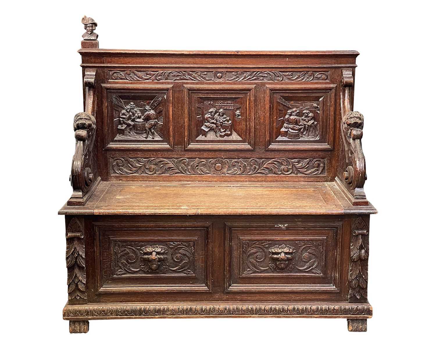 Lot 678 - A late Victorian carved oak bench.