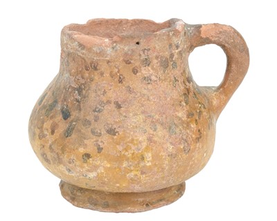 Lot 85 - A bronze age terracotta dipping cup.