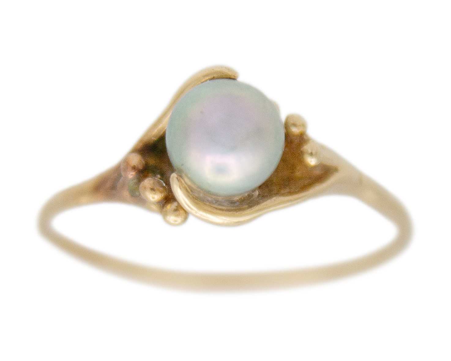 Lot 68 - A higher purity gold and pearl solitaire ring.
