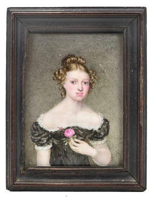 Lot 819 - A portrait miniature on porcelain of a young woman.