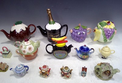 Lot 111 - A Collection of Novelty Teapots.