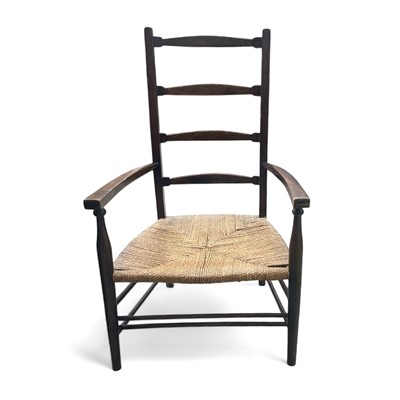 Lot 60 - An arts & crafts ash and reed low, ladder back,...