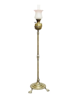 Lot 524 - A Victorian brass standard oil lamp.