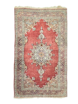 Lot 489 - A Persian Kashan rug.