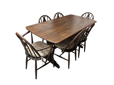 Lot 31 - Ercol Oak Refectory Table, Four Dining Chairs...
