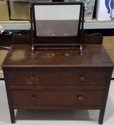 Lot 58 - An Oak Dresser with a Mirror. The measurements...