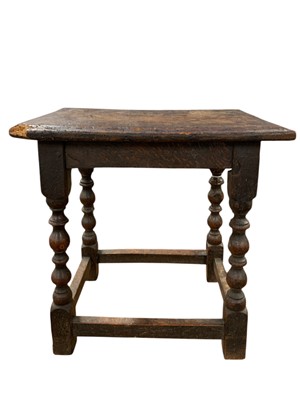 Lot 695 - A 17th century oak joint stool.