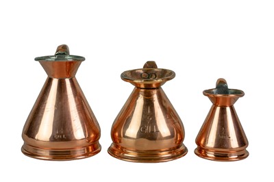 Lot 41 - Six graduated copper measuring jugs.