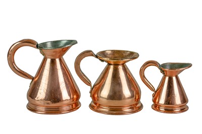 Lot 41 - Six graduated copper measuring jugs.