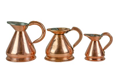 Lot 41 - Six graduated copper measuring jugs.