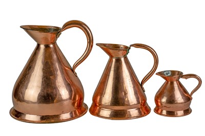 Lot 41 - Six graduated copper measuring jugs.