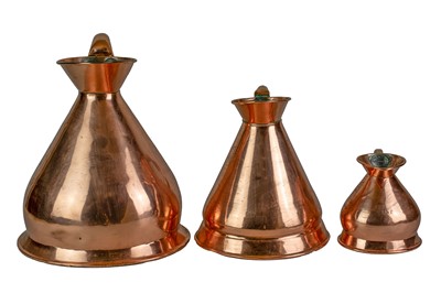 Lot 41 - Six graduated copper measuring jugs.