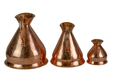 Lot 41 - Six graduated copper measuring jugs.