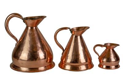 Lot 41 - Six graduated copper measuring jugs.