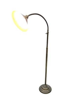 Lot 143 - A brass and copper floor-standing reading lamp,...