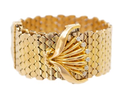 Lot 137 - An 18k gold French strap design adjustable bracelet with a diamond-set buckle.