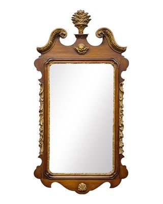 Lot 518 - A George III style mahogany and gilt gesso wall mirror.