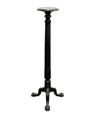 Lot 916 - A 19th century mahogany torchere.