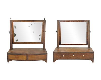 Lot 955 - A George III mahogany swing toilet mirror.