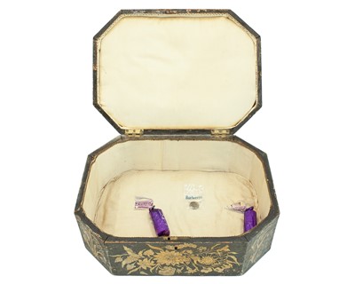 Lot 15 - A black painted pen work casket.