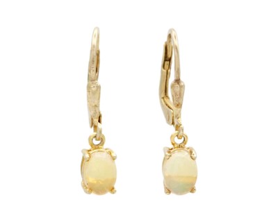 Lot 161 - A pair of silver gilt and opal earrings, the...