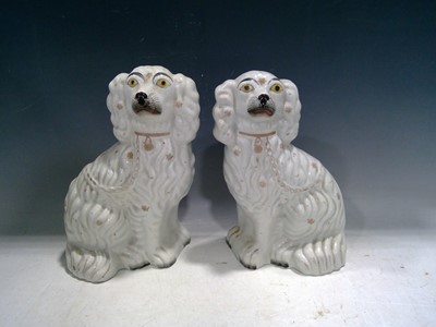 Lot 166 - A Pair of Staffordshire Spaniels. The Spaniels...