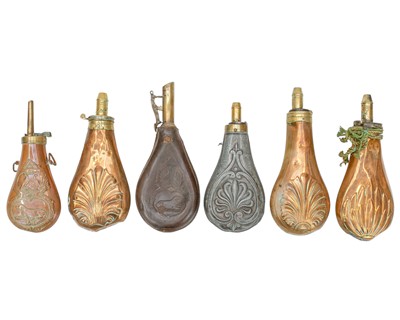 Lot 123 - Four 19th century copper powder flasks.