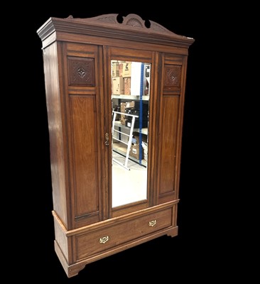 Lot 26 - An Edwardian Mahogany Wardrobe. The Wardrobe...