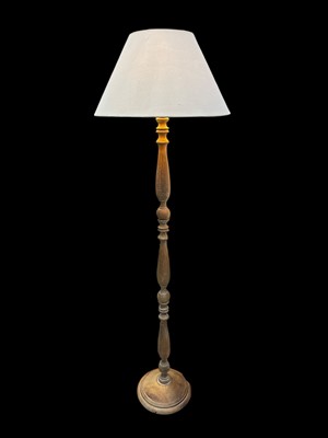 Lot 62 - A limed wood standard lamp in working order....