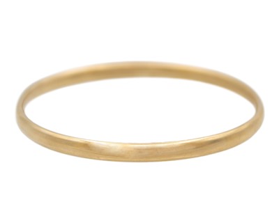 Lot 156 - A 9k gold hollow bangle.