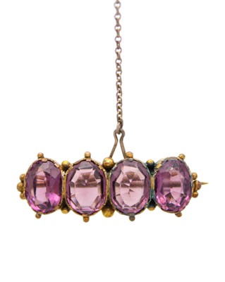 Lot 157 - A Victorian gold paste set brooch.