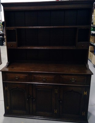 Lot 21 - An Oak Dresser. The Dresser is 180cm tall,...