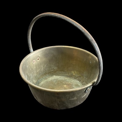 Lot 73 - A brass and steel jam pan, 29cm in diameter.
