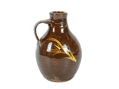 Lot 325 - A small Winchcombe pottery flagon, by Michael Cardew.