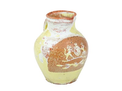Lot 777 - A West country slip ware jug.