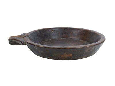 Lot 739 - A large walnut dairy or straining bowl.
