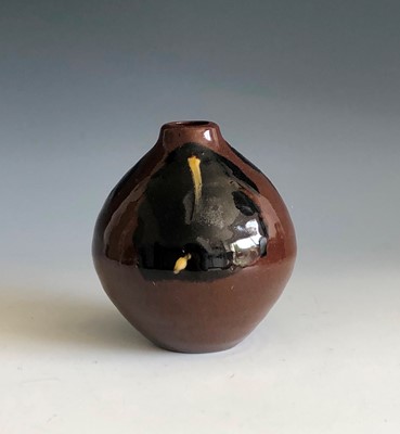 Lot 398 - A Kenneth Quick tenmoku glazed bud vase,...