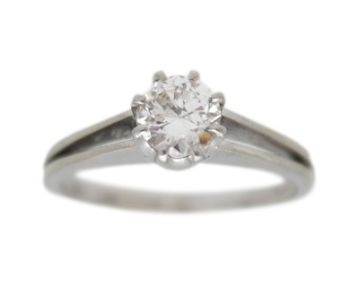 Lot 166 - A diamond solitaire ring in an 18k white gold.