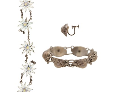 Lot 165 - GEORG JENSEN - a bracelet with one matching earring, and a silver and enamel part bracelet.