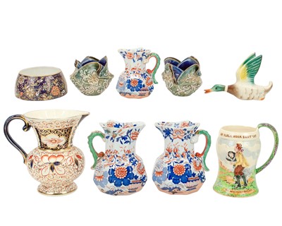 Lot 297 - Three graduating Mason's ironstone hydra jugs.